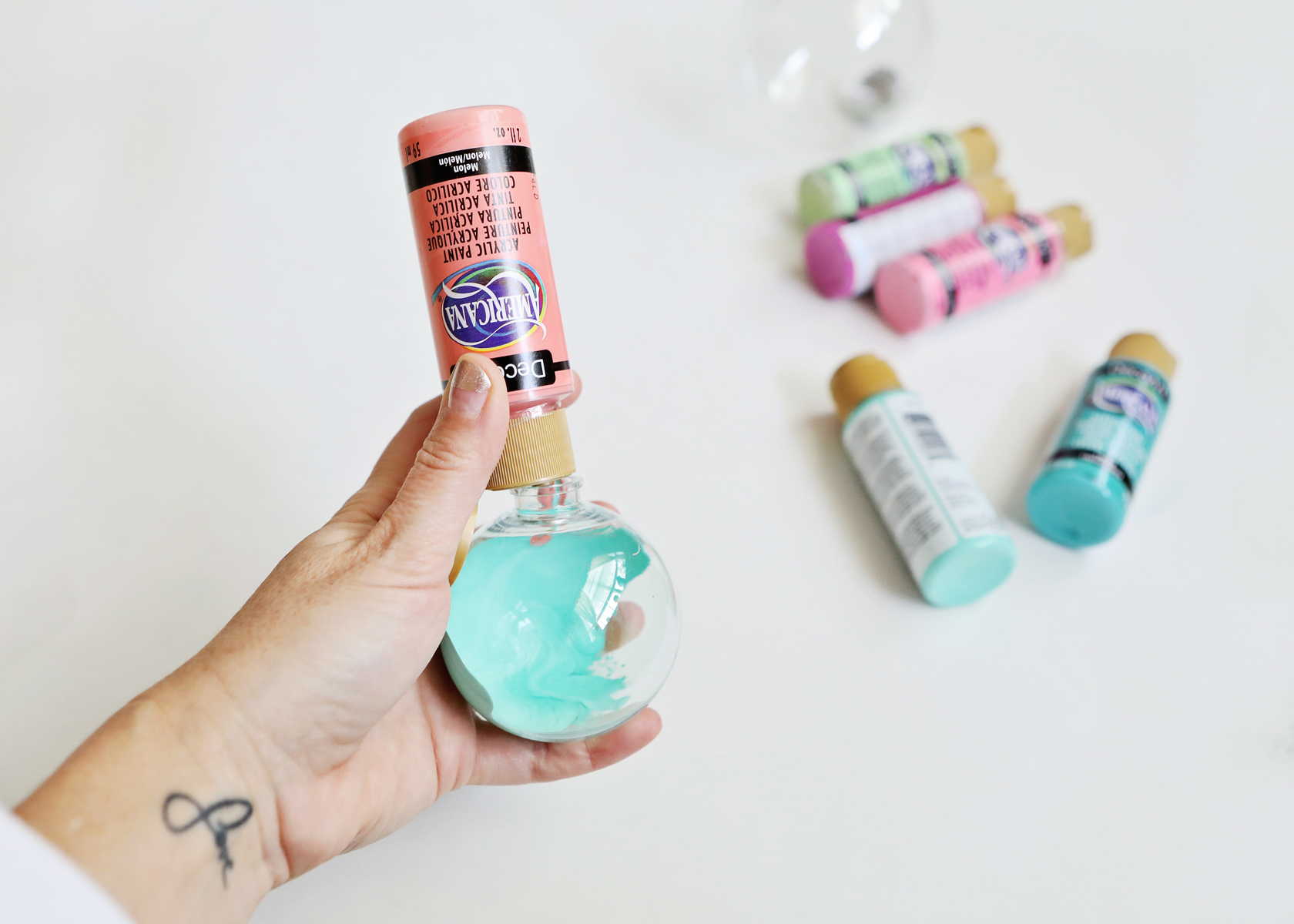DIY Paint Filled Christmas Ornaments